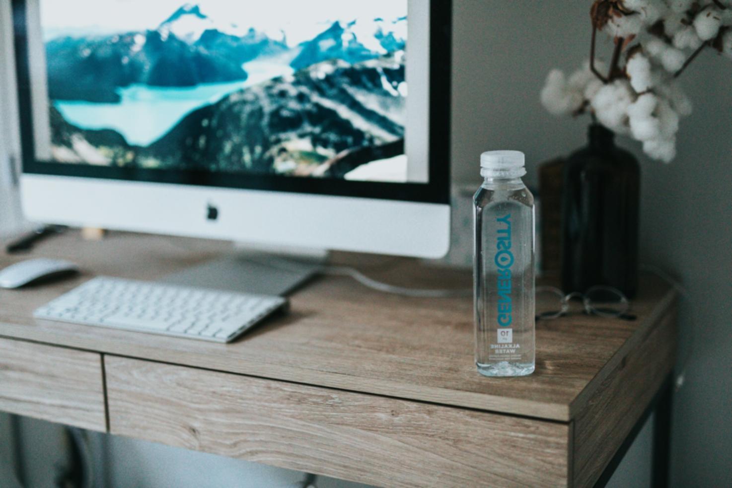 Professional working on budget planning with documents and calculator